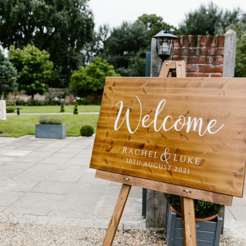 Rustic wooden wedding welcome sign