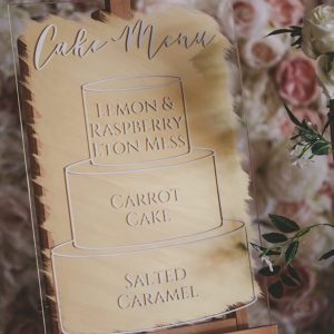 Gold acrylic wedding cake menu
