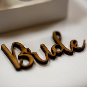 Laser cut lettering bride