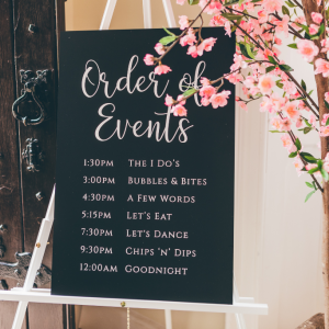 Monochrome wedding signage - order of events