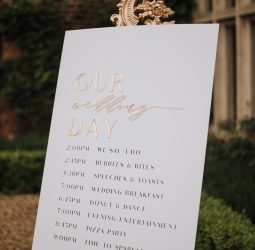 Custom acrylic wedding signage in white and gold